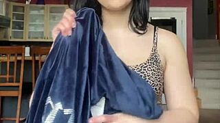 Petite Latina student unboxes and tries on Juicy Couture velour tracksuit for fans.