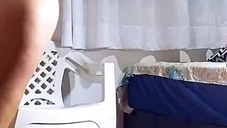 BBW amateur strips and masturbates with a giant dildo in the recording section