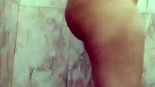 Hot Indian girl indulges in bathroom masturbation craving a massive cock.