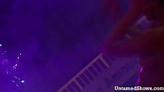 Watch this naughty brunette dance and rip off her clothes?