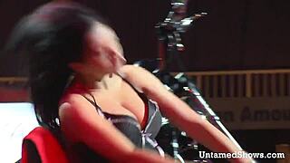 Seductive brunette's tantalizing performance and daring striptease
