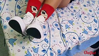 My girlfriend in red socks seduces me with shoes for a footjob and handjob until i cum on her skinny feet
