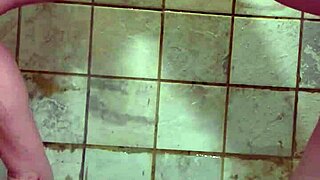 Solo shower scene of a wife with a pierced pussy and dildo play.