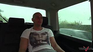Sex in the rain with a beautiful brunette girlfriend in a van