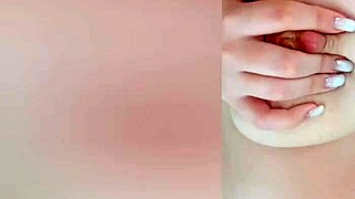 Wow, busty beauty teases big nipples on cam while parents sleep nearby! 😍