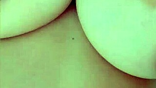 Wow, busty beauty teases big nipples on cam while parents sleep nearby! 😍