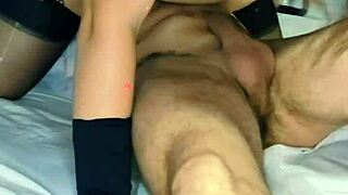 A man watches as his friend seduces his wife in their home.