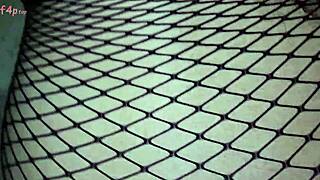 Stepdaughter wears full body fishnet and uses tape to open her ass for anal sex with stepfather in homemade video.
