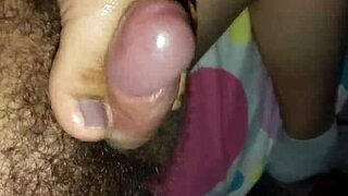 Wife gives foot massage to friend