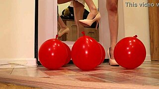 Heels Crush Balloons in Fetish Action