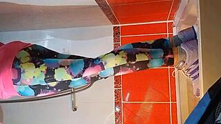 Watch me pee and masturbate with a dildo in the gym shower.