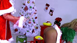 Nadia White spanks Nins Rivera hard for Christmas. Their steamy session heats up quick!