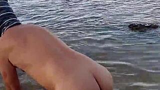 Public beach solo pleasure of a gay Latina shemale