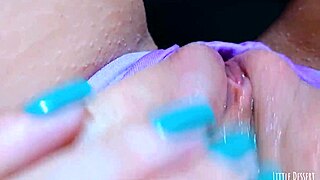 Playing with my shaved pussy in the college bathroom 😜