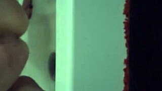 Girlfriend with big tits masturbates using a shampoo bottle in the shower