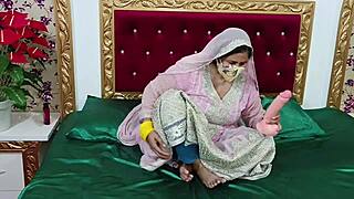 Hot Indian housewife enjoys fingering and dildo play
