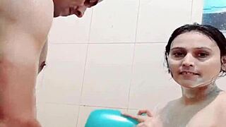 In the bathroom, the desi couple engages in hardcore sex with big tits and monster cock