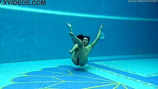 Euro milf Sazan shows off underwater hot curves