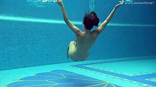 Euro milf Sazan shows off underwater hot curves