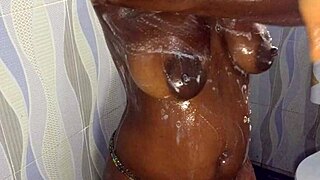 Shaved amateur girlfriend in a hot shower scene at home