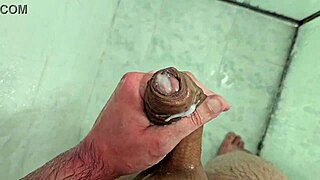 Brazilian twink cums hard in the shower during homemade fetish session!