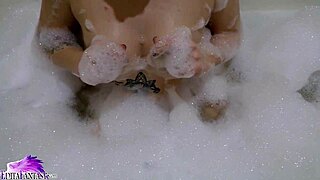 Cute Babe Sucks Huge Dildo in Bath