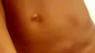 Monika Fox licks and sucks before getting piss in mouth during shower.