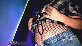 Housewife in fishnet stockings having an orgasm