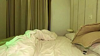 Busty latina alone in hotel bedroom uses dildo on pussy and asshole