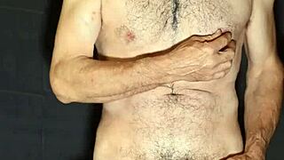 gay man intriguingly exhibits his monster cock while masturbating in public