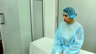 Sexy doctor examines and kisses patient in hospital room