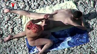 Young man seduces big-chested cougar MILF at the beach