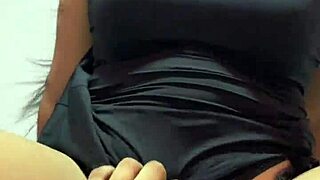 Amateur video of a horny housewife in a tight dress