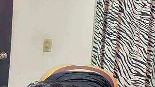 Amateur video of a horny housewife in a tight dress
