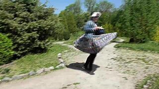 Cross dressing wife showing off her hairy beaver in a public park