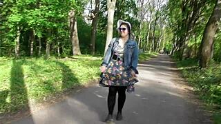 Cross dressing wife showing off her hairy beaver in a public park