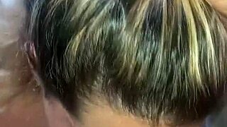 Beautiful blonde gets a facial in a friendly blowjob competition