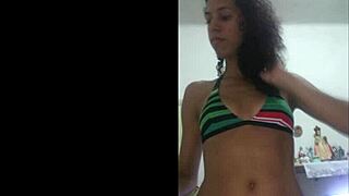 Pretty brunette in red bikini, amateur tease
