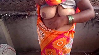 housewife flaunts big boobs during village house display