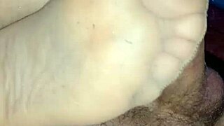 i give a sensual footjob in tan stockings