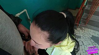 Risky Public Blowjob on Staircase with Long-Haired Friend