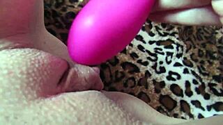 Wet vibrator on a big clit for an orgasmic experience