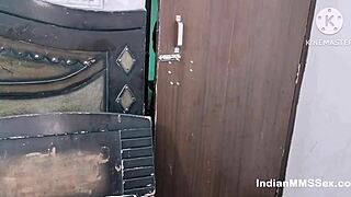 An Indian Muslim woman in a hijab is having sex with her husband