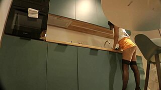 A flash of a cute sexy housewife in the kitchen