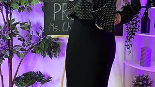 Sexy milf slips into leather harness suit for steamy teacher roleplay