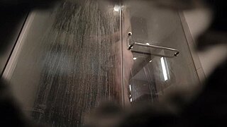 an amateur couple enjoys a shower together