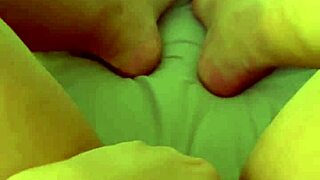 The naughty wife masturbates in shorts before work