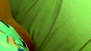 The naughty wife masturbates in shorts before work