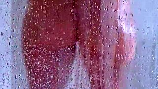 Watch her butt and bounce her curves in this explicit shower 18 only video