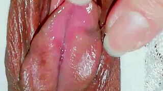 Asian Close-Up Reveals Tight Wet Pussy Details